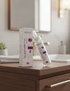 Cosmetic bottle and packaging on a bathroom counter with a blurred background